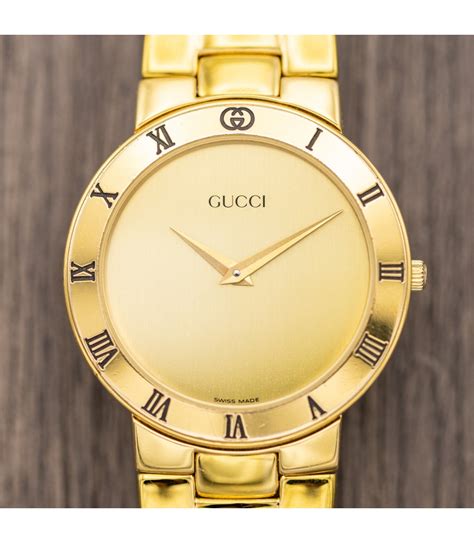 old gold gucci watch|Gucci watch gold detailing.